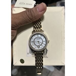 Anne Klein Women’s Gold-Tone Watch Mother-of-Pearl Dial Crystal Bezel